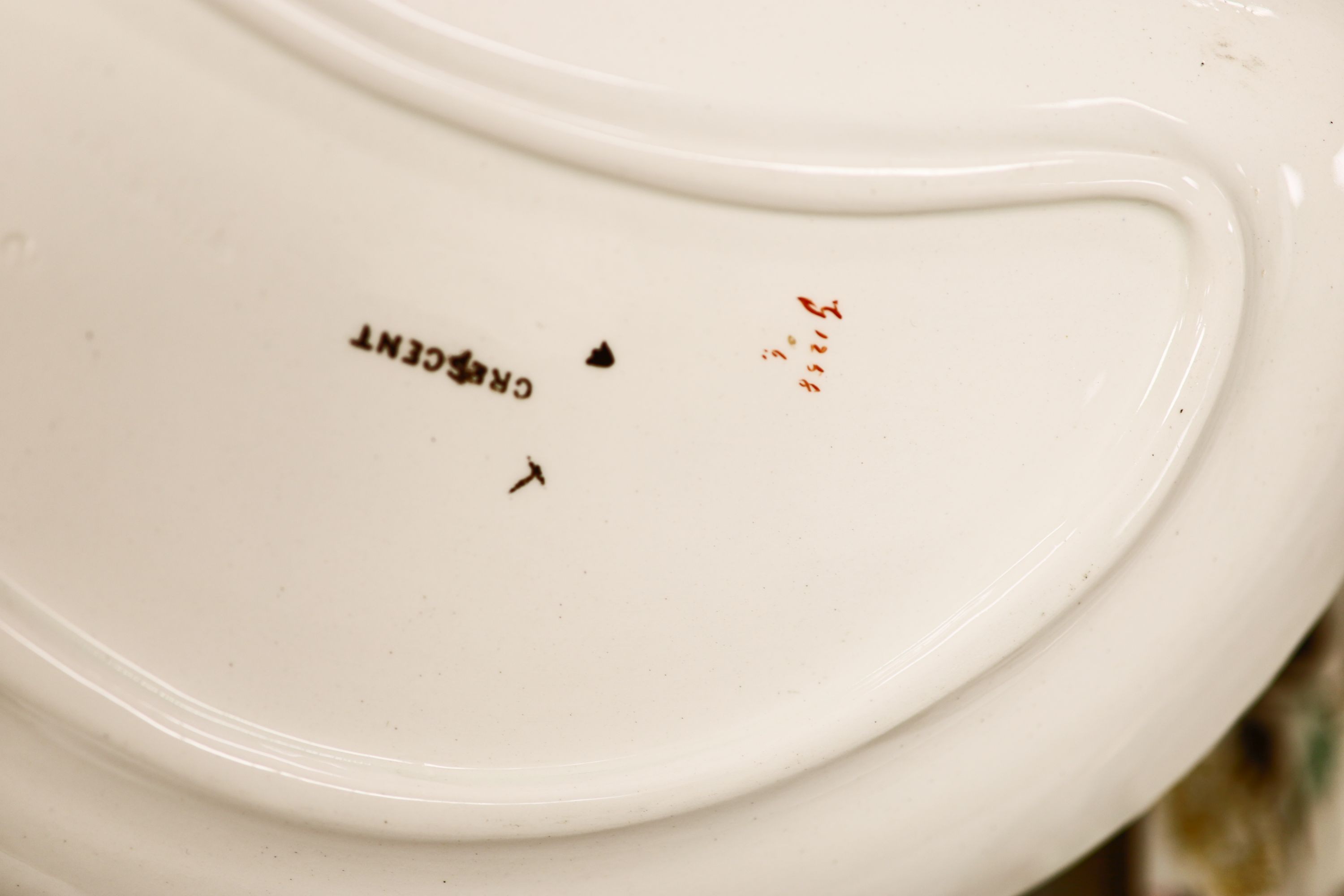 A Wedgwood Crescent pattern creamware part dinner service, the borders decorated with pink blossoms and chrysanthemums (approx. 65 pieces)